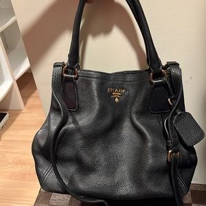 Prada purse with two straps. Light signs of wear. Lots of space!